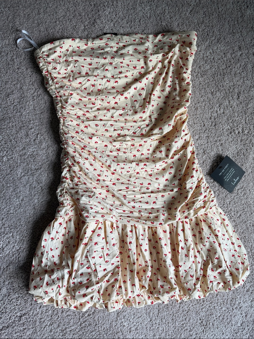 Lulu's Cream Strapless Mini Dress with Red Cherry Motif and Ruffle Hem